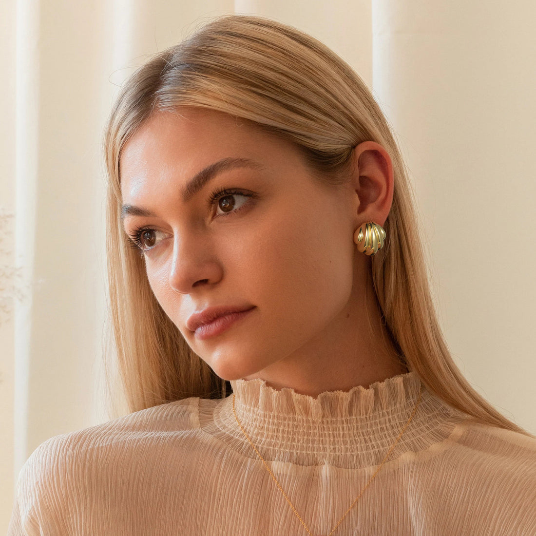 Golden, layered shell earrings