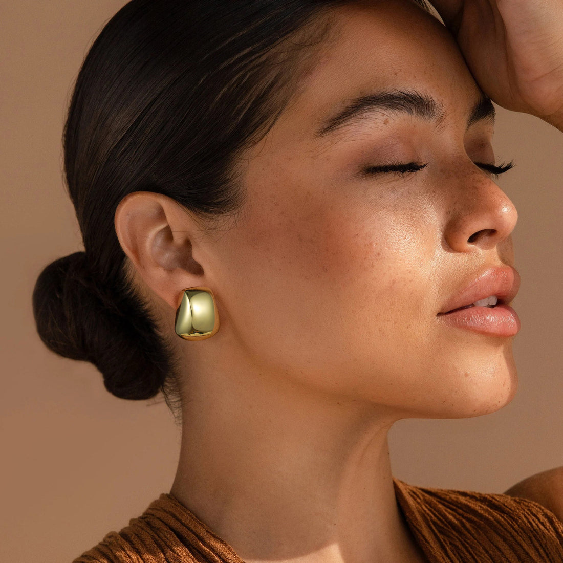 Golden, round axe head earrings