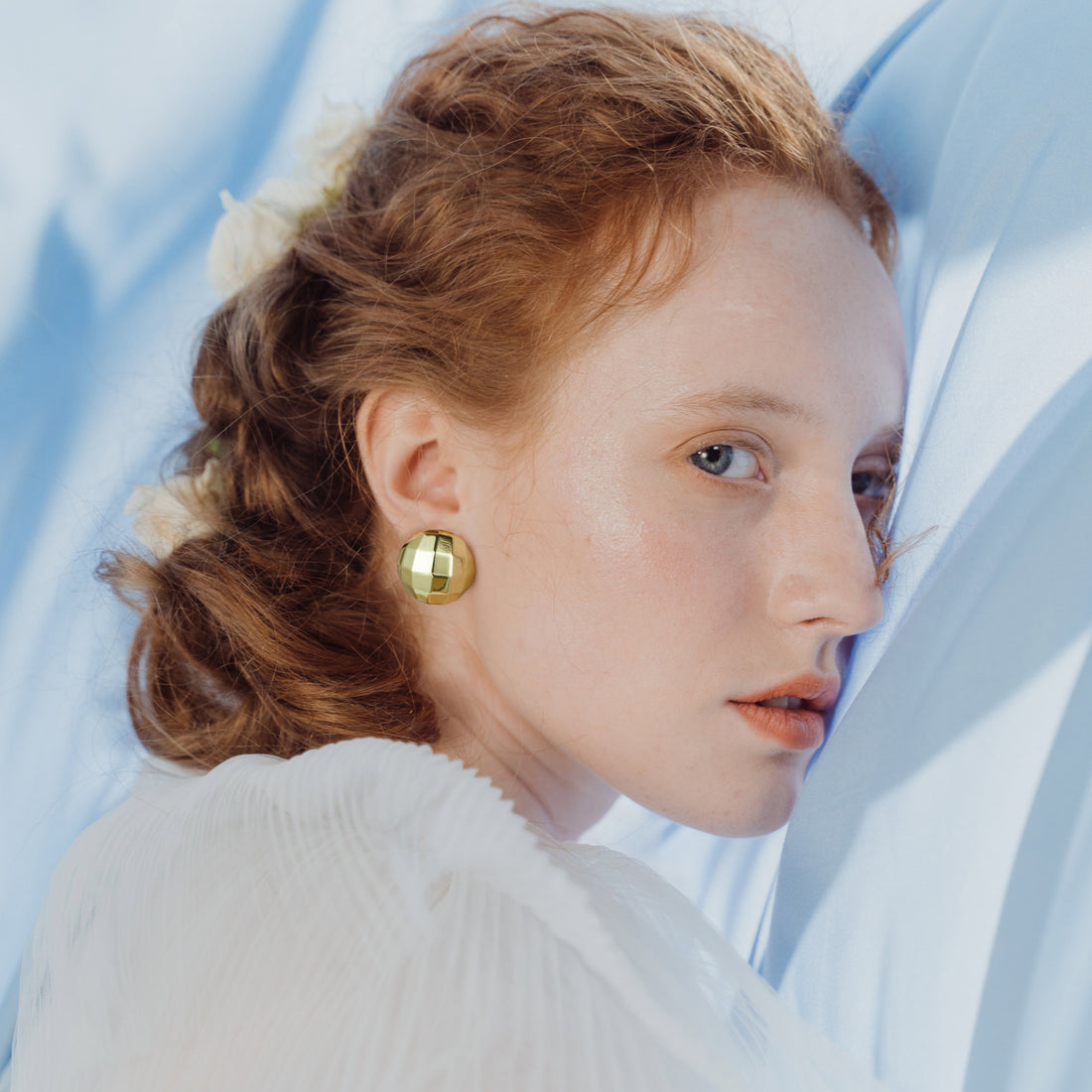 Golden, hemispherical checkered earrings
