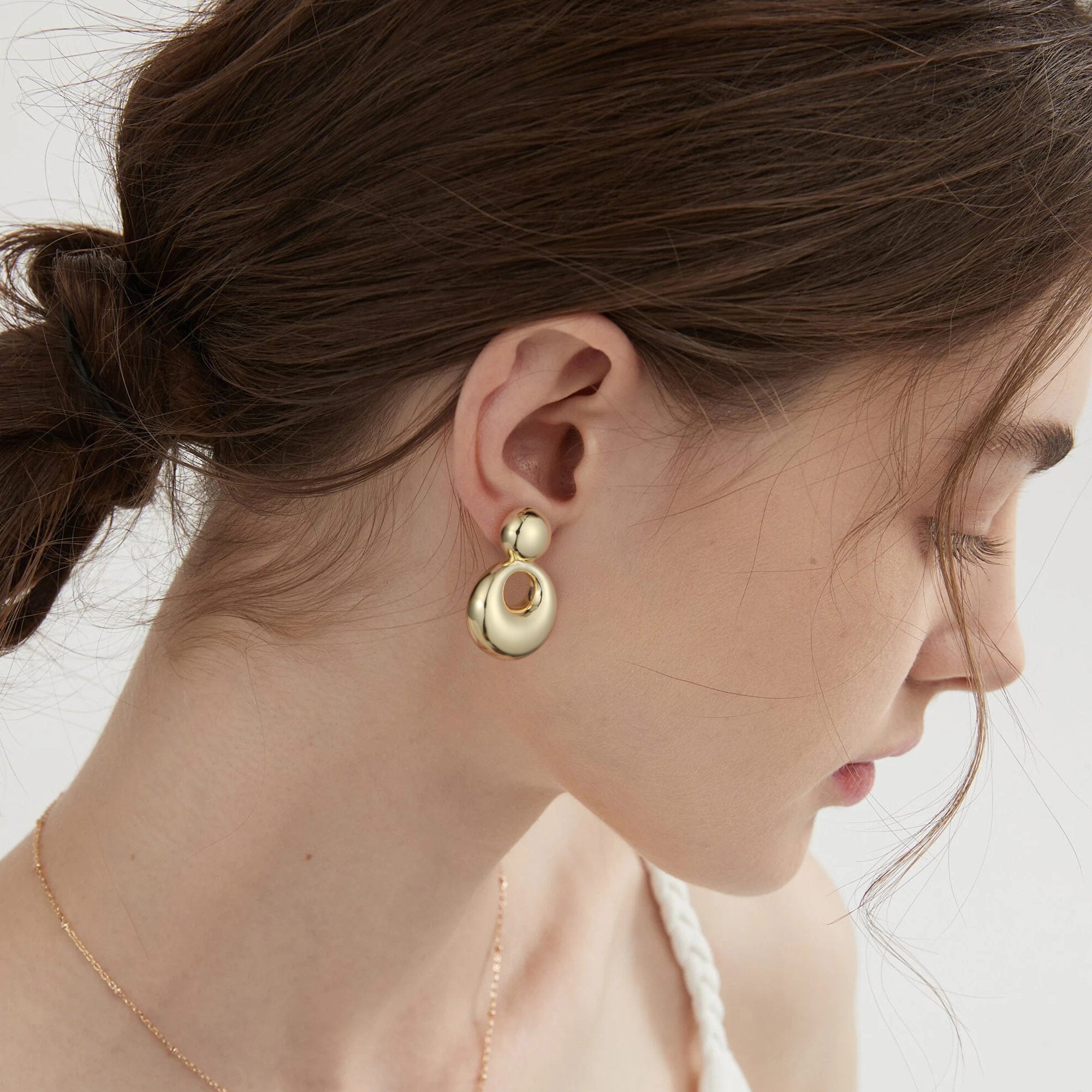 Gold, small solid and large round earrings