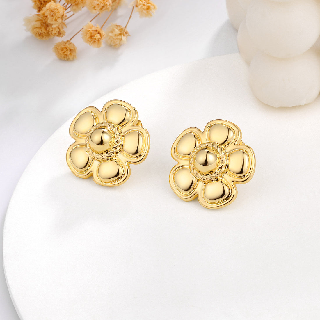 Golden, five-petaled earrings